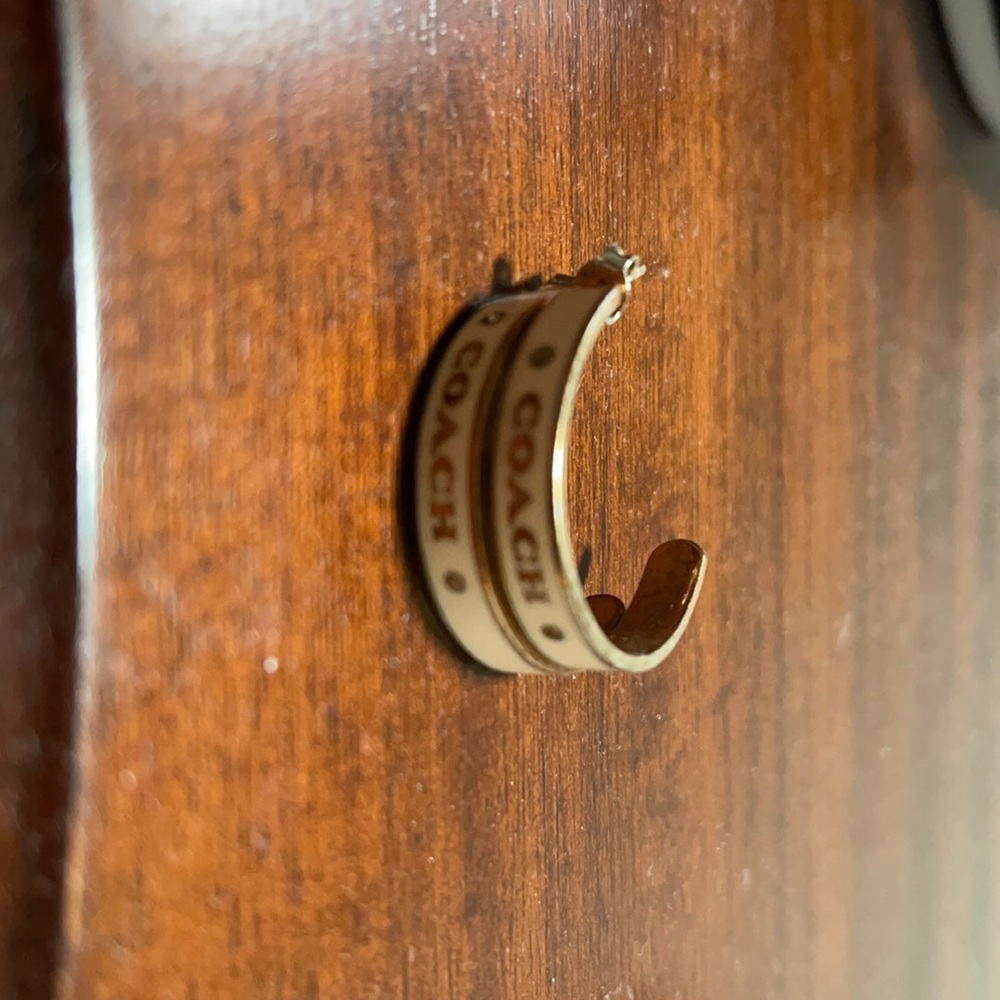 Coach earrings.